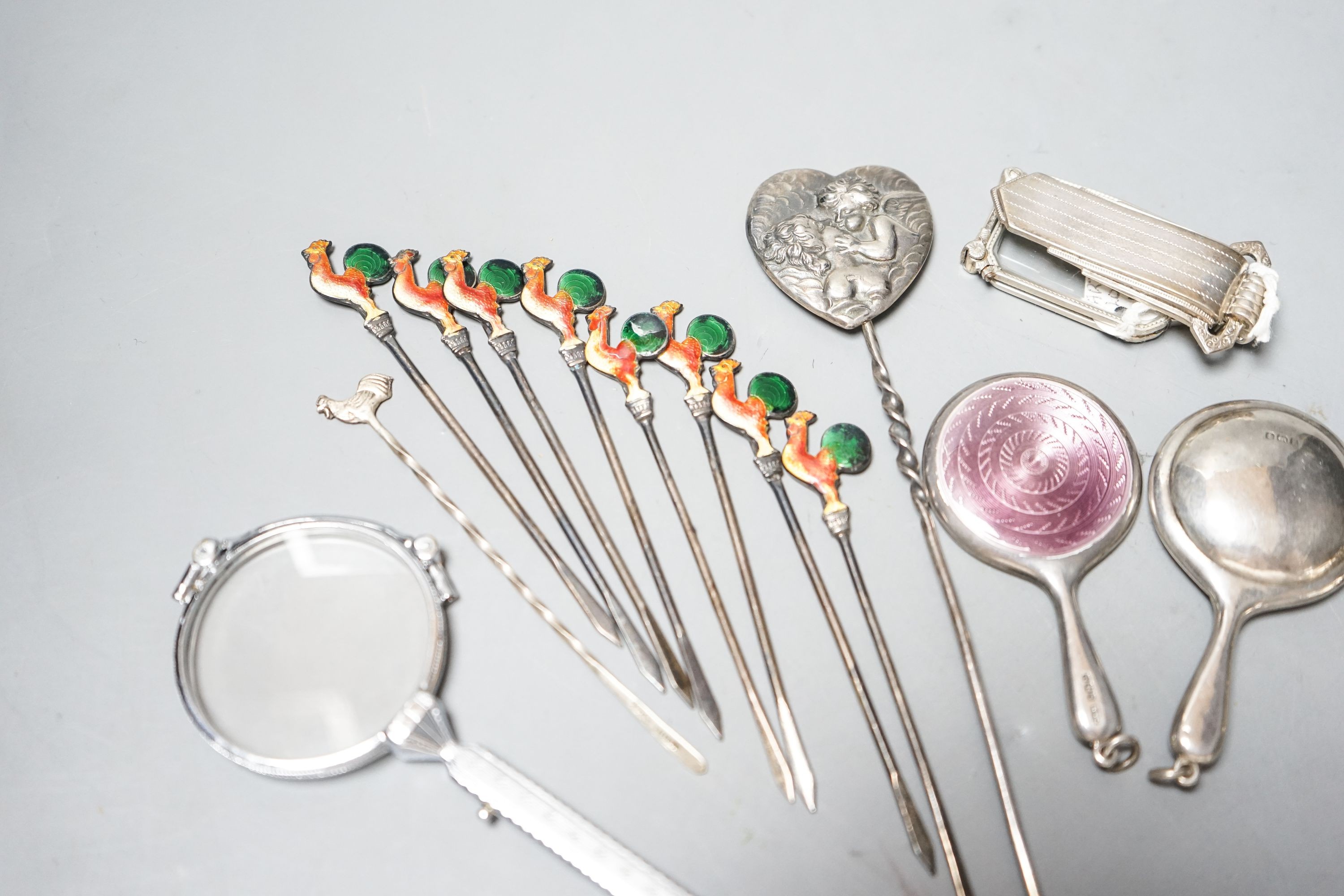 Small silver and white metal including enamelled handbag mirror and one other, a vesta case enamelled cocktail sticks, two metal lorgnettes etc.